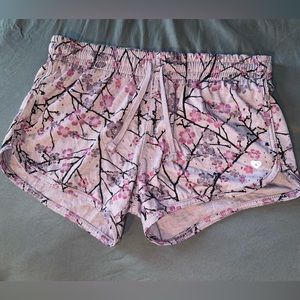 Floral printed lavender women’s size medium athletic shorts. Colosseum Brand.